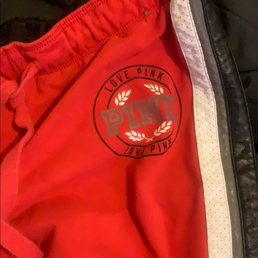 Red and blackwhite and grey striped joggers